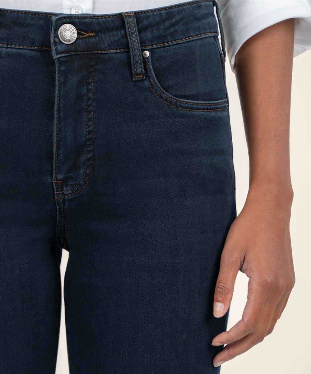 Model wearing Kut from the Kloth Kelsey flare jeans in Illustrate wash