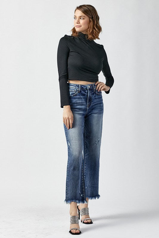 Model wearing Risen high rise straight leg crop jeans – dark denim